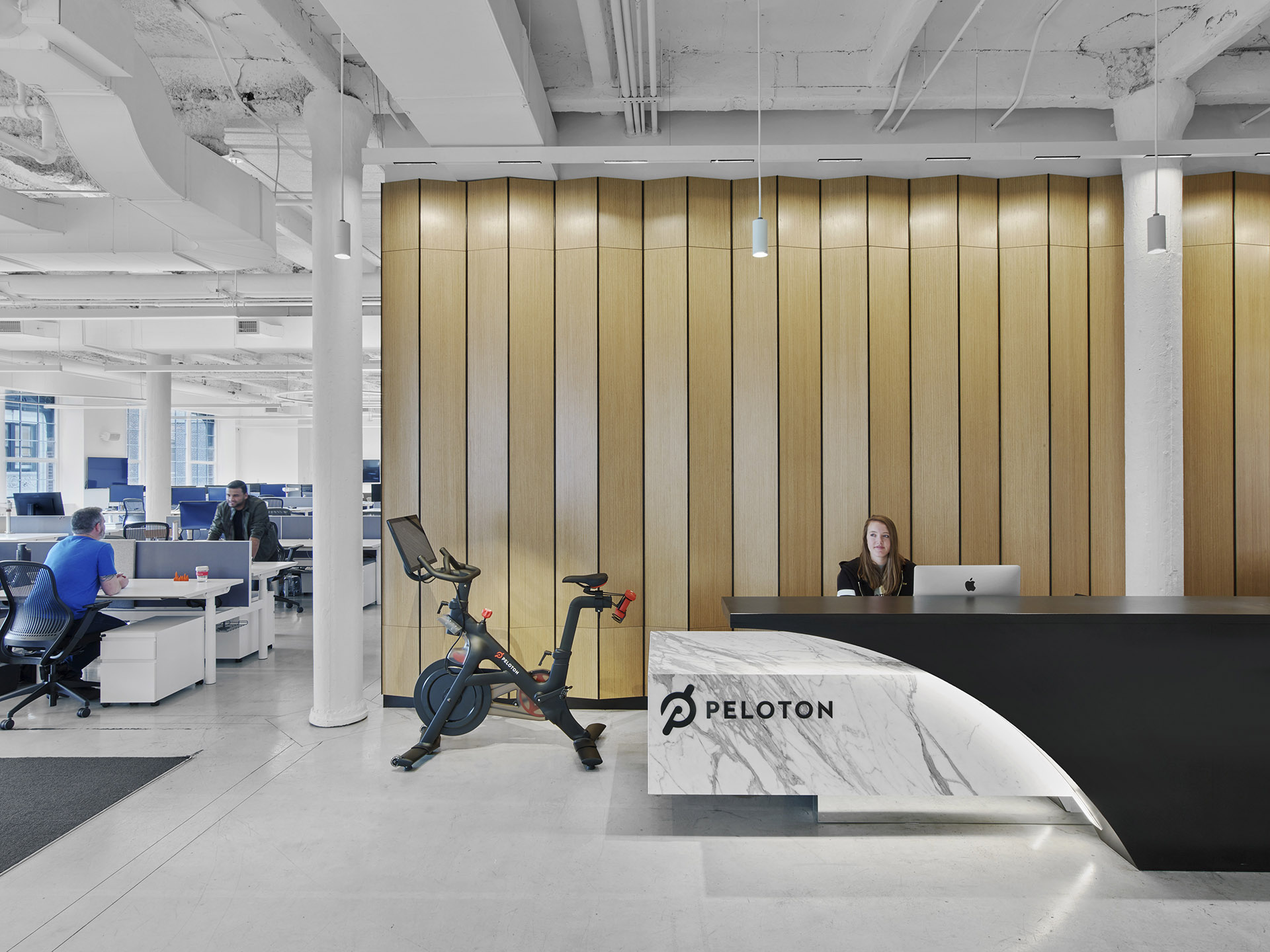 Custom reception and reception desk at Peloton's First Headquarters
